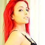 Pic of Hot Redhead Nina Doing A Sexy Striptease