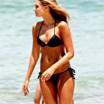 Pic of Laura Dundovic in black bikini on Bondi Beach