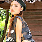 Pic of Lusty Asian Girl Flashing While Wearing A Police Vest