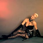 Pic of Busty Brigitte Nielsen shows deep cleavage photoshoot