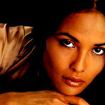 Pic of Laura Gemser topless and fully nude, shows her hairy bush