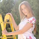 Pic of Alexis Crystal Posing Near a Ladder