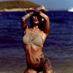 Pic of Becky Holt in her bikini getting wet on the beach | Web Starlets