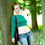 Pic of Nerdy natural amateur strip teasing in the woods at PinkWorld Blog