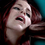 Pic of SexPreviews - Bella Rossi pantyhose redhead is bound between metal pipes in dungeon