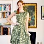 Pic of British redhead Zara Du Rose gets to upskirt tease in a retro polka-dot dress and classy tan nylons