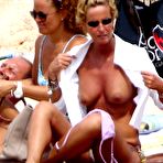 Pic of Federica Mancini sunbathing topless on a beach