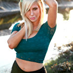 Pic of Charming chippy Tasha Reign is posing outdoor in her tiny top and shorts