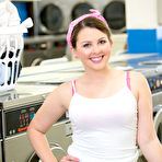Pic of Short teen Cali Hayes plays with herself at the laundromat when the owner comes by and helps her out