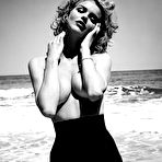 Pic of Eva Herzigova topless on the beach black-&-white photoset