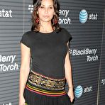 Pic of Gina Gershon posing for paparazzi Blackberry Torch launch party