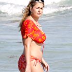 Pic of Busty Josie Goldberg shows side of boob on the beach in Miami