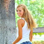 Pic of Blonde teen Jessi FTV with beautiful ass and shaved pussy takes off her blue panties outdoors