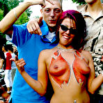 Pic of Pinky A with painted boobs gives blowjob and gets boned in public place
