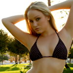 Pic of Kristine rocking some bikinis at the park.