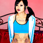 Pic of 
      Krissie Dee exposes her inked body and pink snatch
    