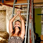 Pic of Submissed.com video: HOT BABE TIED TO LADDER CLEAVEGAGGED VIBED