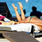 Pic of Busty Rita Rusic caught in green bikini on the beach in Miami