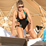 Pic of Rita Rusic shows cleavage on the beach in Miami