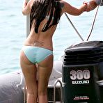 Pic of Tulisa Contostavlos in blue bikini on a beach & yacht