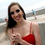 Pic of Licentious chick Kelly Divine has her gape stuffed by cock and cummed on her tits at the beach
