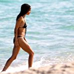 Pic of Zoe Kravitz in black bikini on a beach
