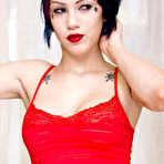 Pic of Big boobed goth temptress Asphyxia removes her red lingerie and fingers her tight hole