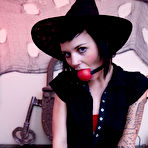 Pic of Skinny goth girl Allister in Halloween hat and gloves takes off her red bra and panties