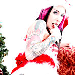 Pic of Naughty goth girl Joanna Angel in red and white Xmas outfit toys her pussy