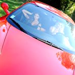 Pic of Danielle Maye, Krystal Webb in Foot frenzy on a Ferrari!