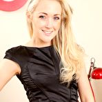 Pic of You have to love blonde Lucy Anne as she is posing in a tight fitting black sexy dress!