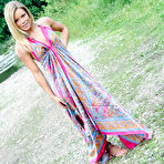 Pic of Incredible blonde Meet Madden goes out to the lake for a softcore striptease in her long dress.