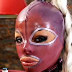 Pic of Lesbian rubber-clad dolls Black Angelica and Eve Angel have fun with each other