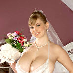 Pic of Bride Christy Marks strips out of her wedding dress