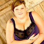 Pic of Plump slut Carly PlumperPass with massively big tits and shaved snatch has interracial sex