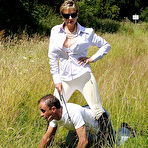 Pic of The slave of Lady Sonia can do nothing when she rides and tramples him outdoor