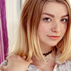 Pic of Blond-haired teen in a choker showing off her natural big breasts - aMetart.com