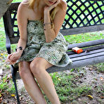 Pic of Shoeless blonde Kelly Space in nice summer dress shows off her lovely feet outdoors