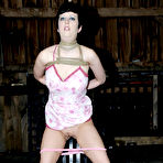 Pic of SexPreviews - Cherry Torn busty brunette is rope bound in different positions in a barn