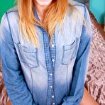 Pic of Denim-wearing redheaded teen fingering her juicy little pussy on cam - IamXXX.com