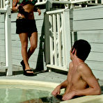 Pic of Xana Star and Mika Tan fuck Daniel at both ends with strapons at the poolside