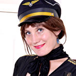 Pic of [All Over 30] Sultry redhead Katrina Mathews is dressed up as a sexy airline pilot - IWantMature.com