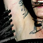 Pic of Stacey Stax gets clamps and pegs on her snatch, nipples, tongue and armpit area.