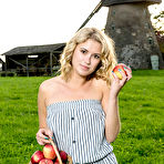 Pic of Free Casey poses with a bunch of red apples as she shows off her smooth and delectable assets