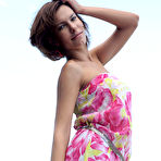 Pic of Suzanna A sensually poses outdoors as she strips her beautiful dress.