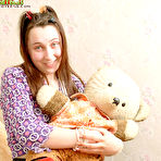 Pic of This hot teen naughtily plays with adult toys but still loves her teddy-bear pics