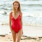 Pic of Newcomer Ingrid strips her red bikini as she bares her beautiful body on the sand. - Hotnudegf.com