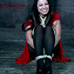 Pic of SexPreviews - Dana Vixen in red dress with black pantyhose is rope bound by lezdom