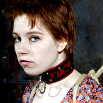 Pic of SexPreviews - Piper Hill submissive redhead is rope bound with clamps in kinky dungeon