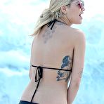 Pic of Rita Ora in black bikini on a beach in Miami